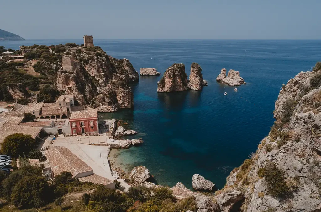 Aerial view of the Faraglioni of Scopello during a wedding in Sicily.