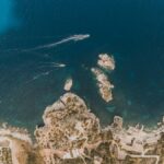Aerial view of the Faraglioni of Scopello during a wedding in Sicily.