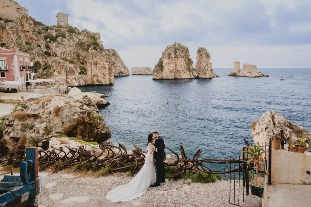 Destination wedding couple on the Sicilian coast.