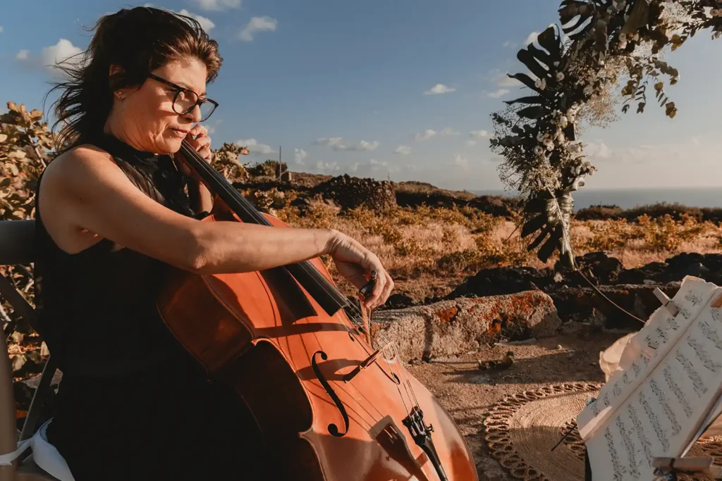Cellist performing at a wedding in Pantelleria.