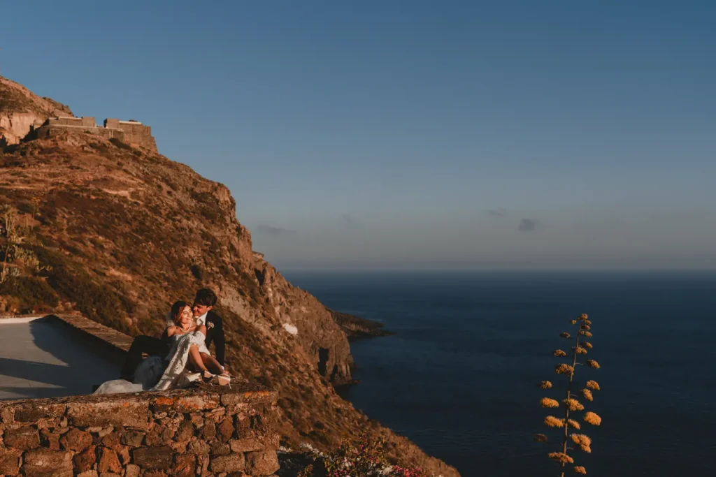 Newlyweds at sunset at Dammare in Pantelleria.