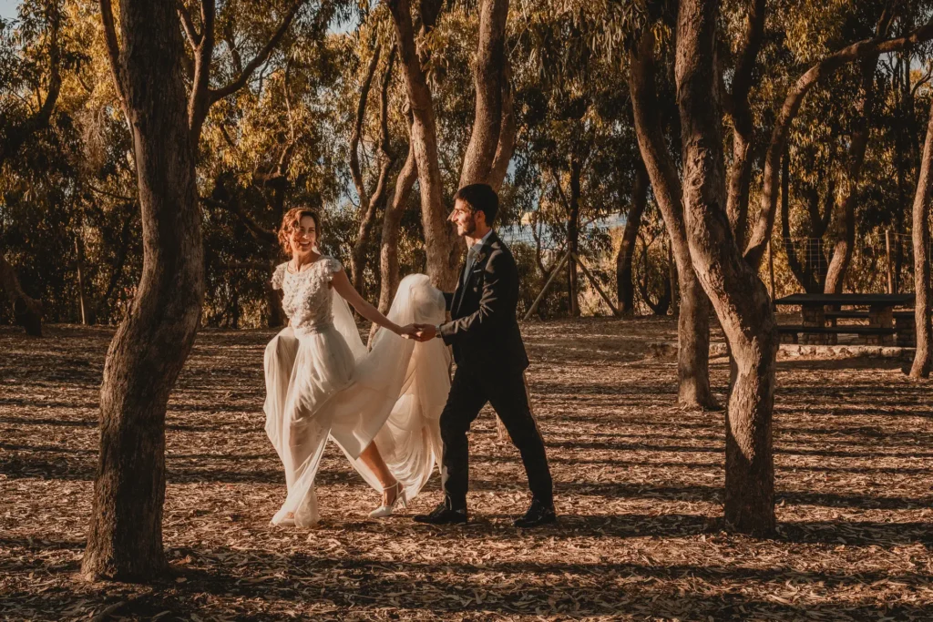 Newlyweds at sunset during a wedding in Sicily.