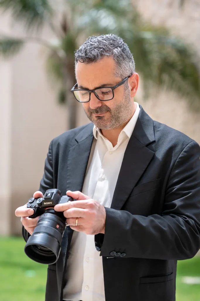 Tommaso D’Angelo photographing a wedding in Sicily.