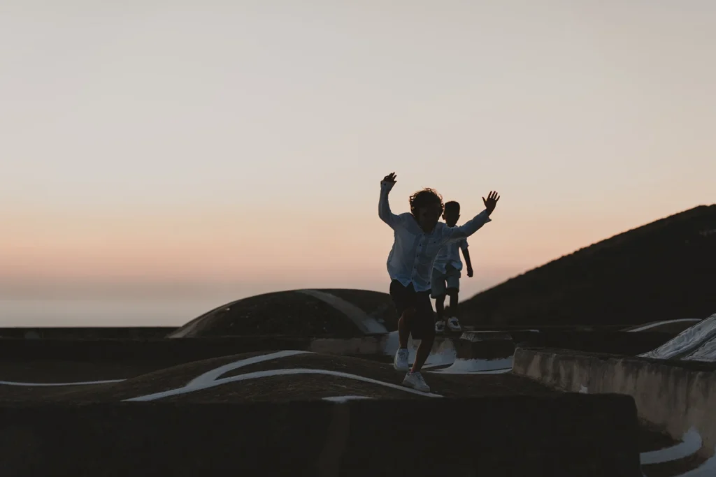 Children playing on the roofs of Pantelleria’s dammusi during a wedding.