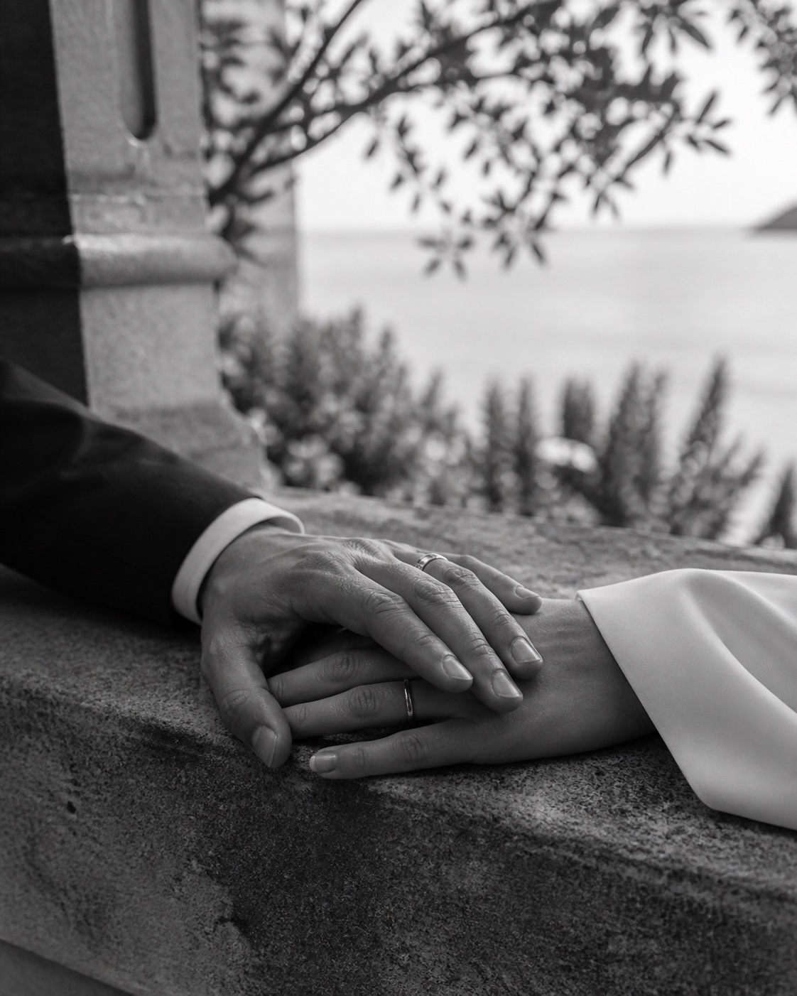 Anonymous wedding-ring detail photographed privately on a Sicilian terrace
